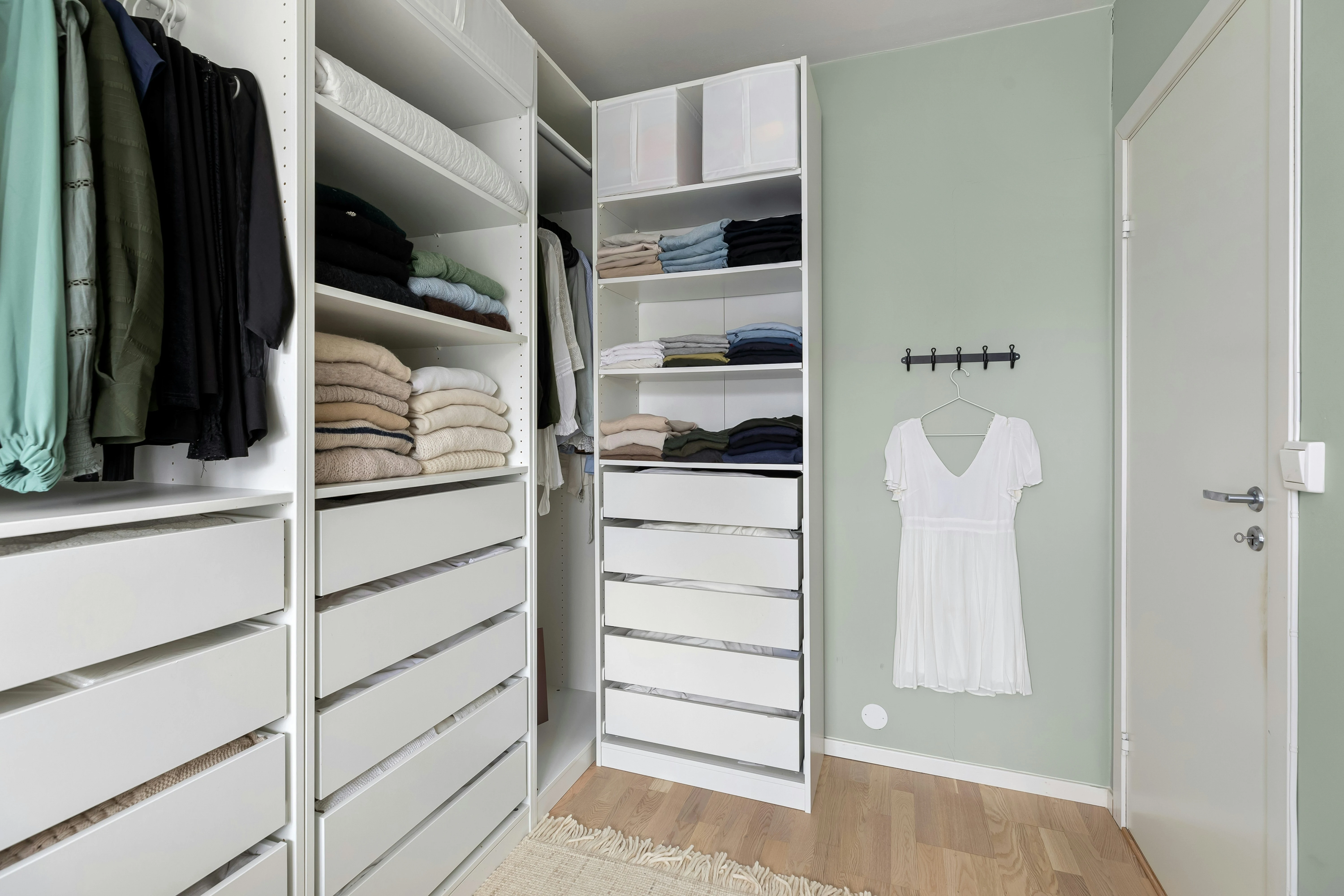 Organised wardrobe with practical clothing storage